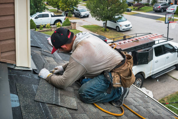Professional Flat Roof Repair technician working in Hettinger, ND